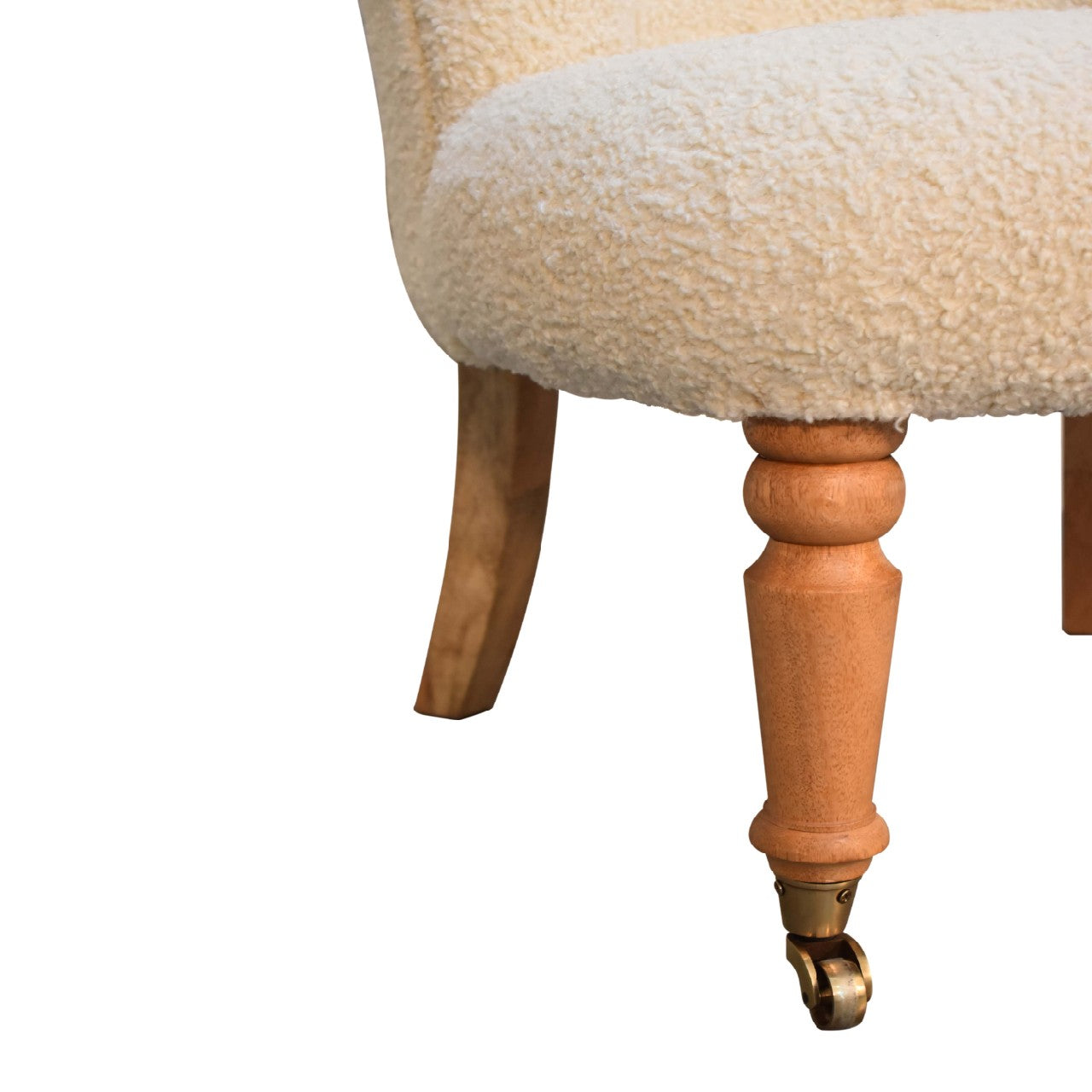 Cream boucle accent chair. Chair with wooden legs and a fluffy cream cushion seat