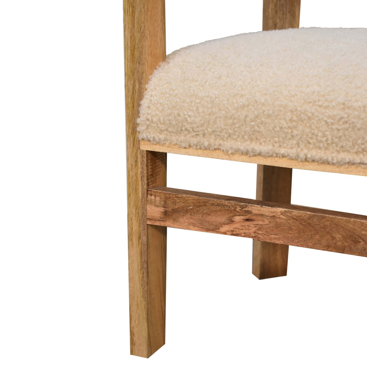 Boucle and wood occasional chair. Wooden chair with a cream cushion