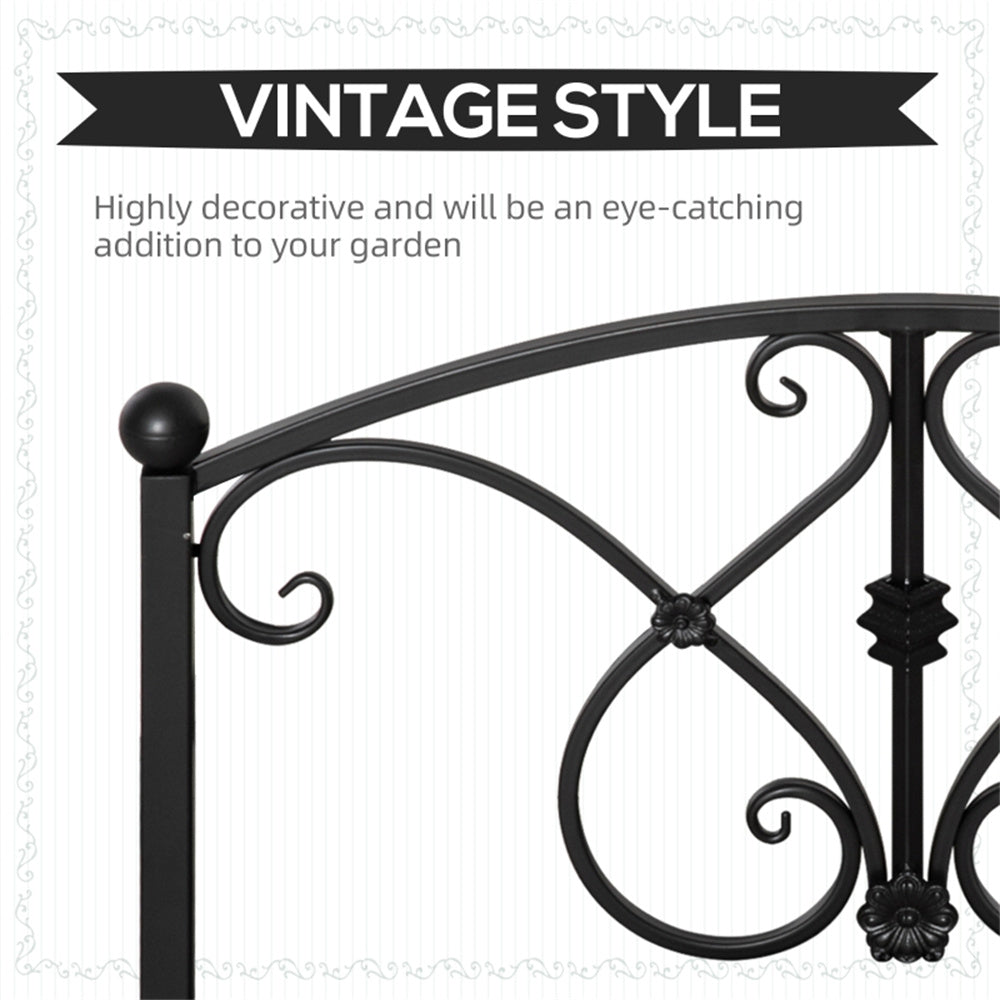 Vintage style steel frame garden bridge. Decorative black metal railing with vintage style text