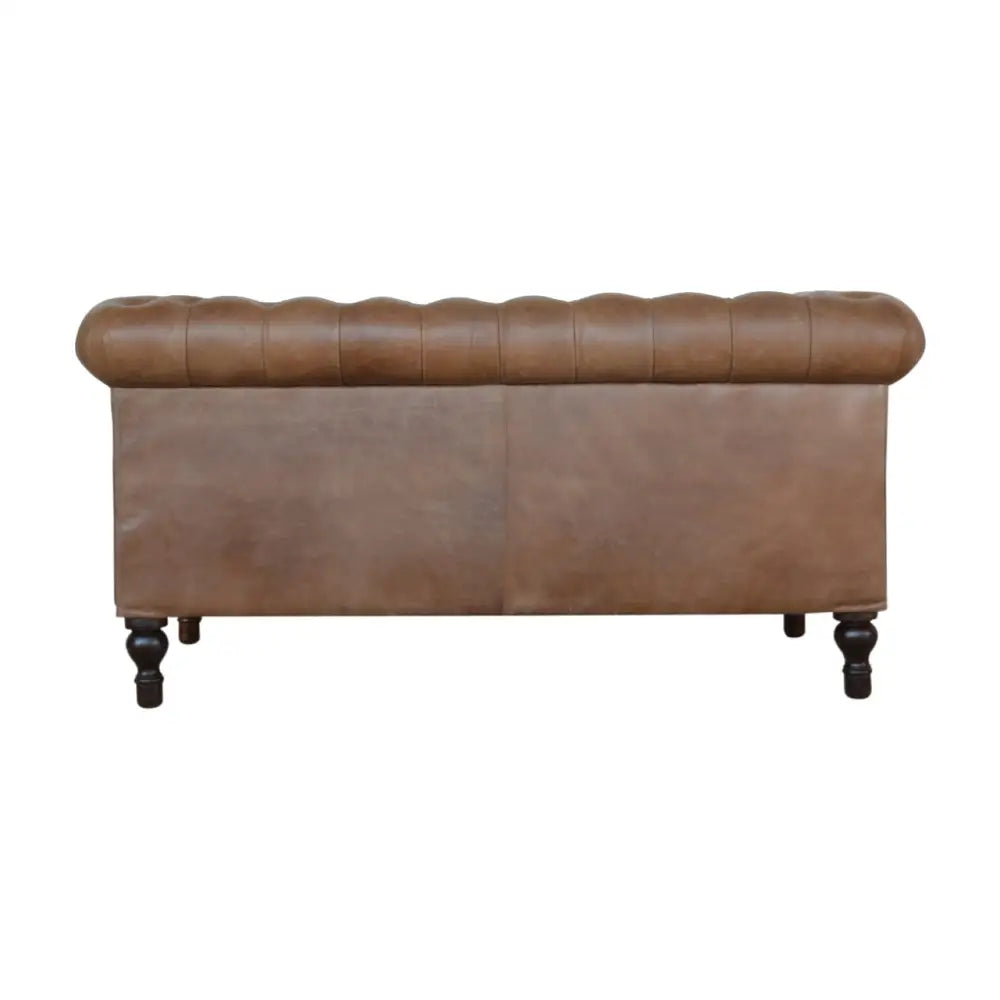 Buffalo leather chesterfield sofa. Brown leather sofa with tufted backrest