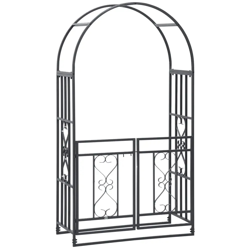 Elegant steel garden arch with gate. Black metal garden arch with decorative patterns