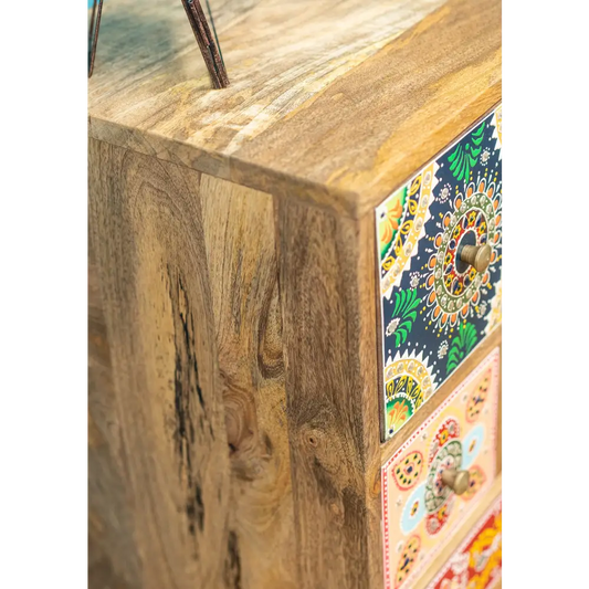 Hand-Painted 9-Drawer Sankalaka Cabinet. Wooden furniture with a decorative patterned door