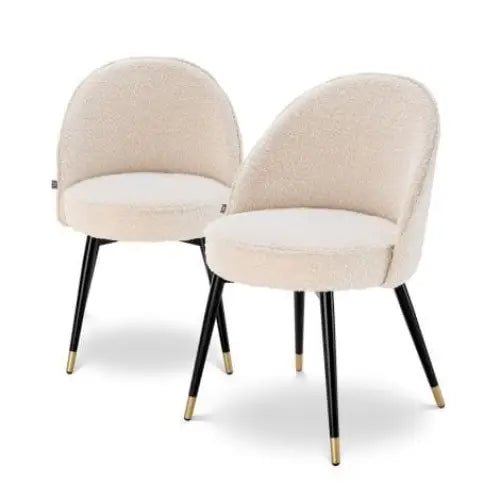 Two Luxury cream upholstered chairs with black legs