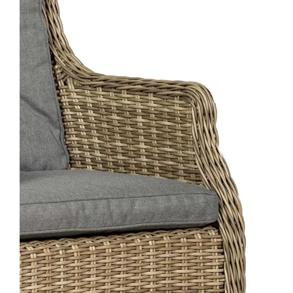 Wicker chair with gray cushion 