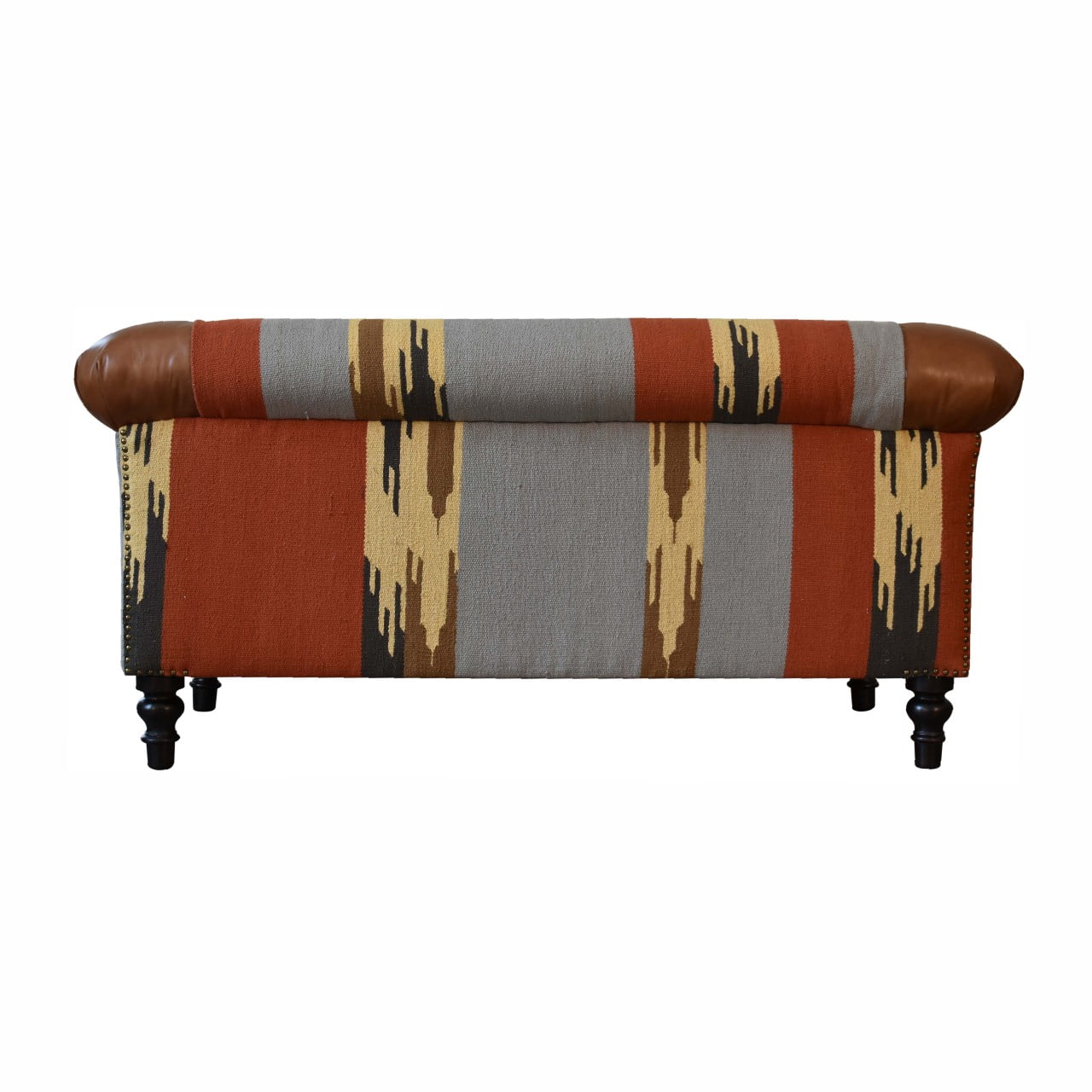 luxury leather and fabric mix sofa. Patterned with brown, grey, and beige design 