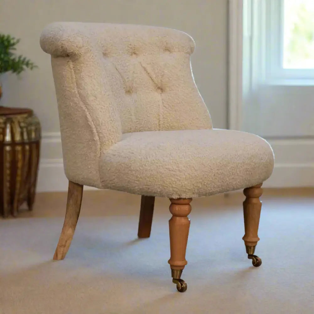 Cream boucle accent chair. Cream upholstered chair with wooden legs 