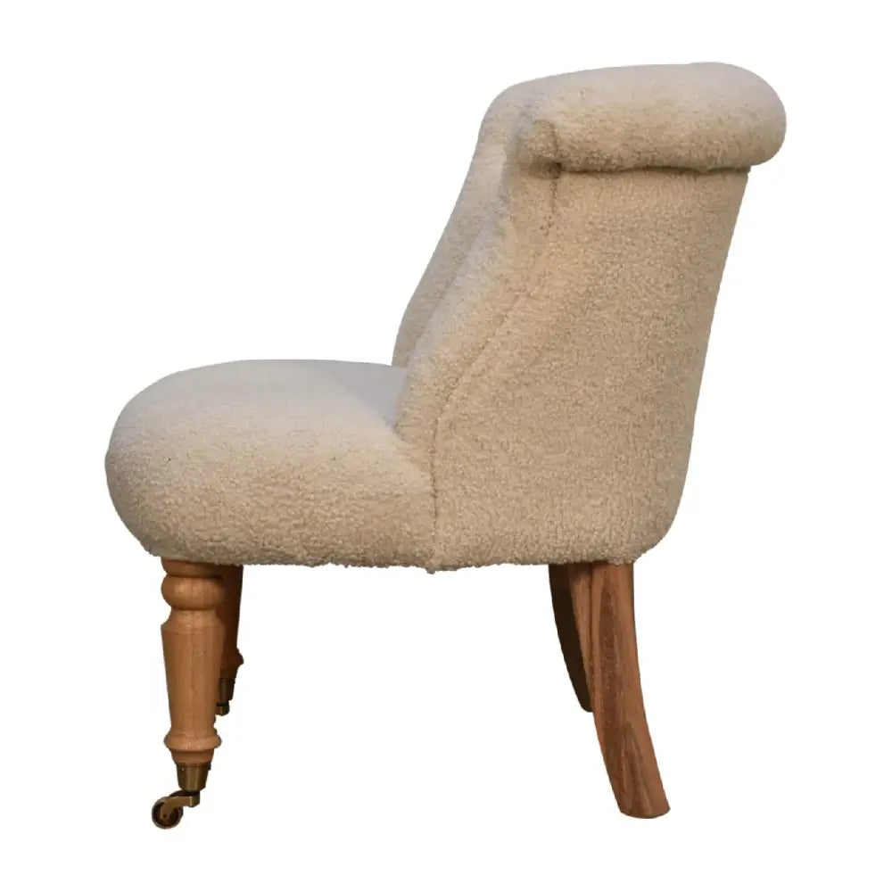 Cream boucle accent chair. upholstered chair with wooden legs 