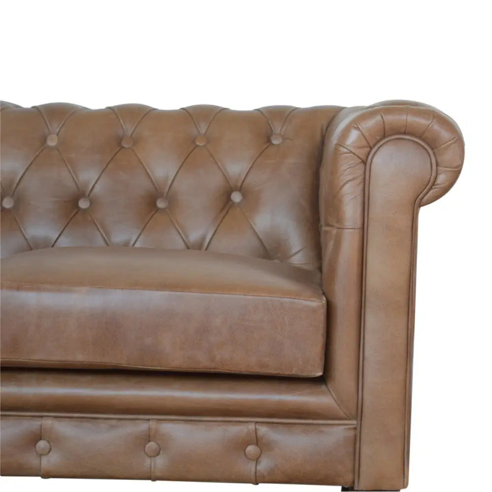 Buffalo leather chesterfield sofa. Brown leather sofa with tufted backrest 