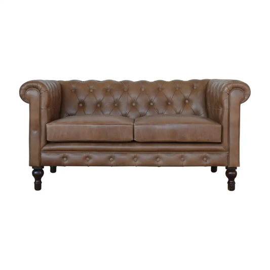 Buffalo leather chesterfield sofa. Brown leather sofa with tufted backrest 