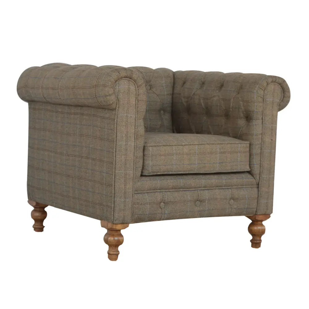 Sustainable furniture. Brown Fabric armchair with wooden legs. Tweed Chesterfield Chair
