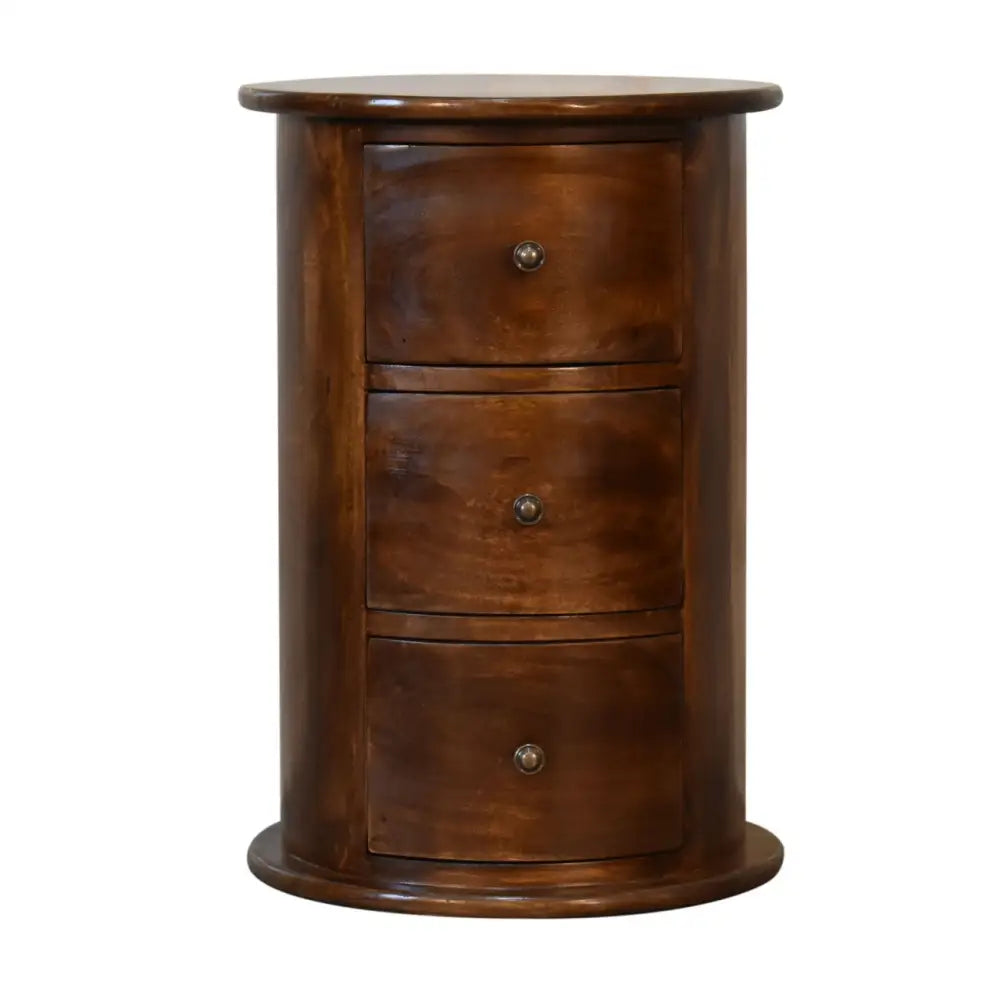 Eco-friendly home decor. Drum Bedside Table with Drawers Wooden cylindrical cabinet with three drawers. Sustainable furniture. 