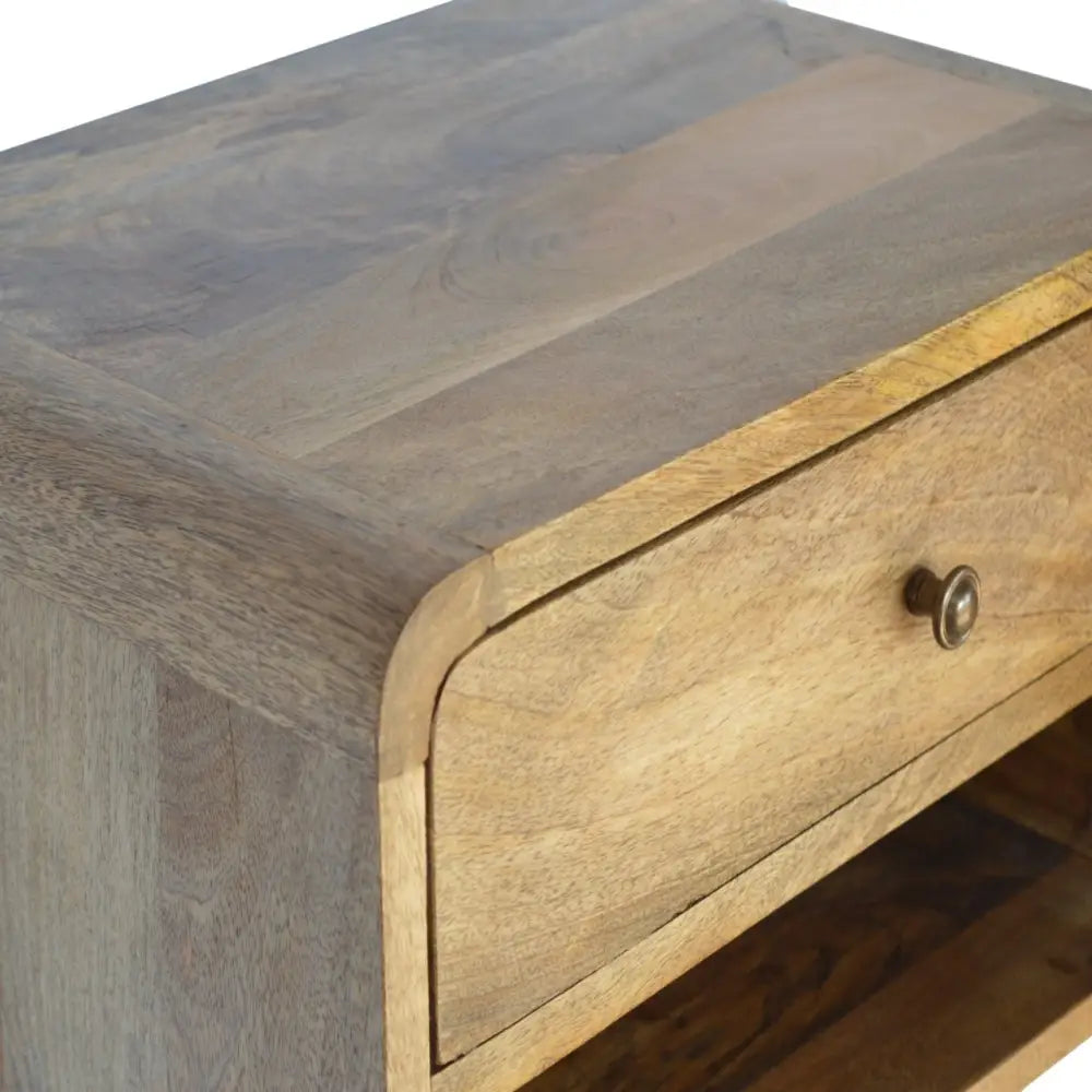 Wooden bedside table with a drawer and metal handle. Eco-friendly home decor. Sustainable furniture. 