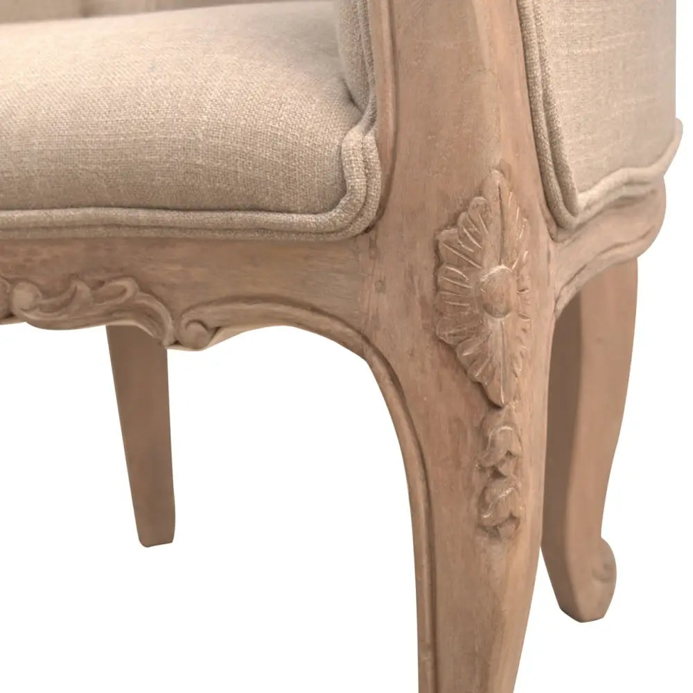French Style Bedroom Chair. Close-up of a decorative chair with intricate carvings 