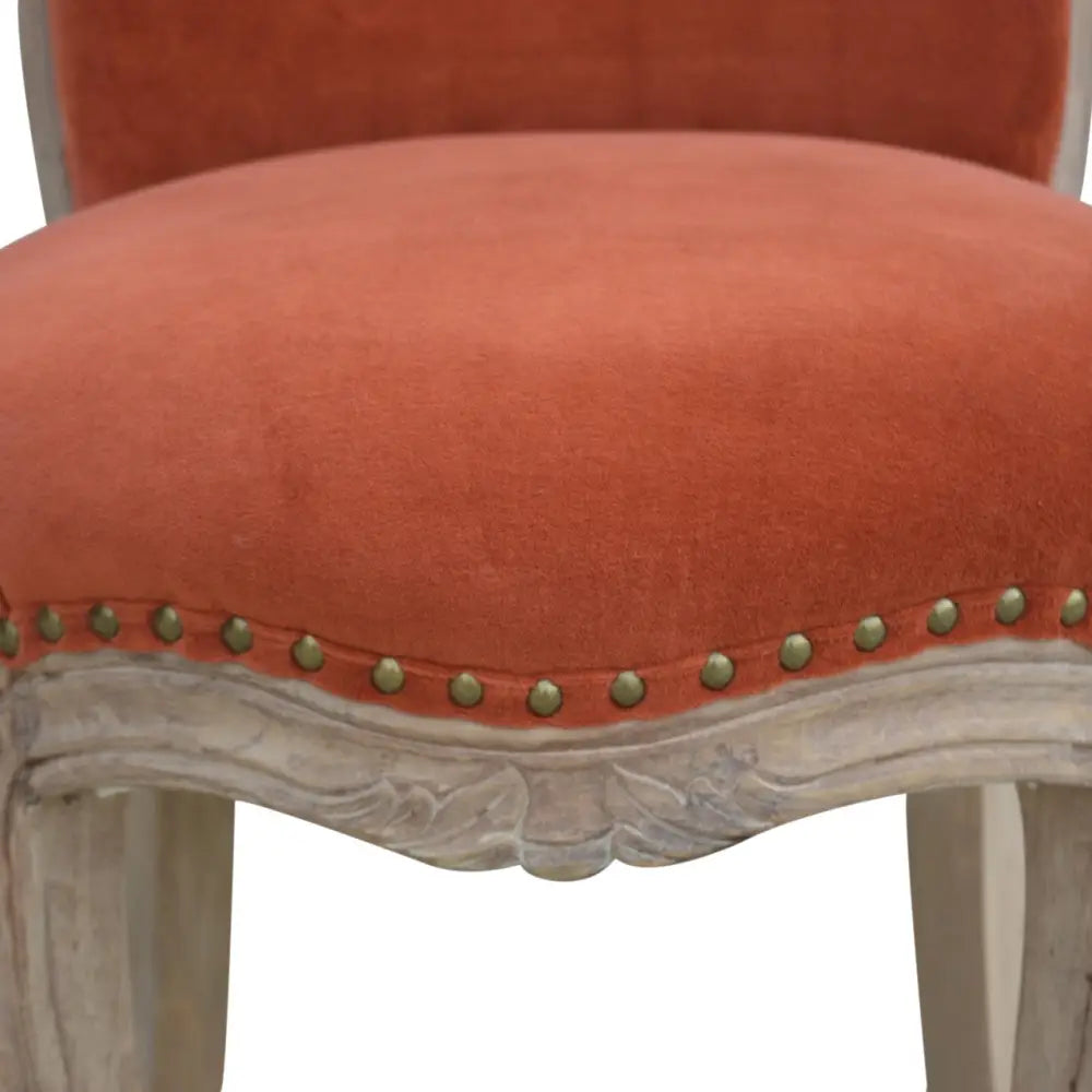 French Style Chair. Available in various sumptuous colours. Chair with orange cushioned seat and decorative trim 