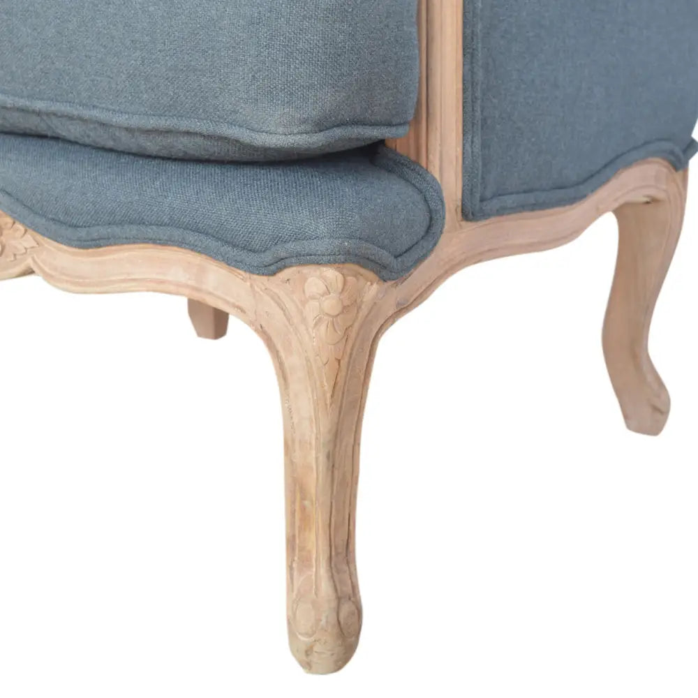 French Style chair. Close-up of a chair with grey fabric and wooden legs. In various sumptuous colours