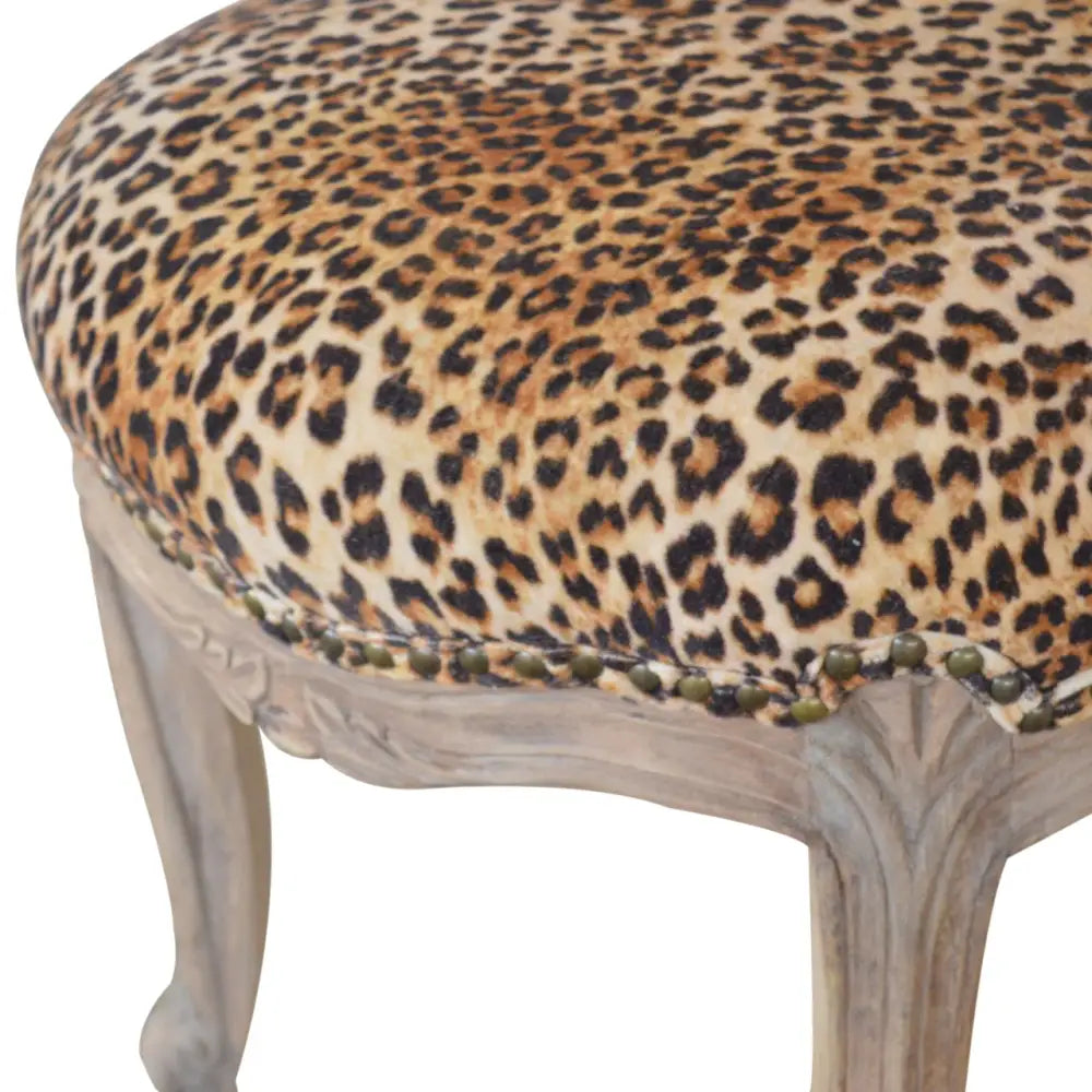 Leopard Print Velvet Chair. With leopard print  and wooden legs 