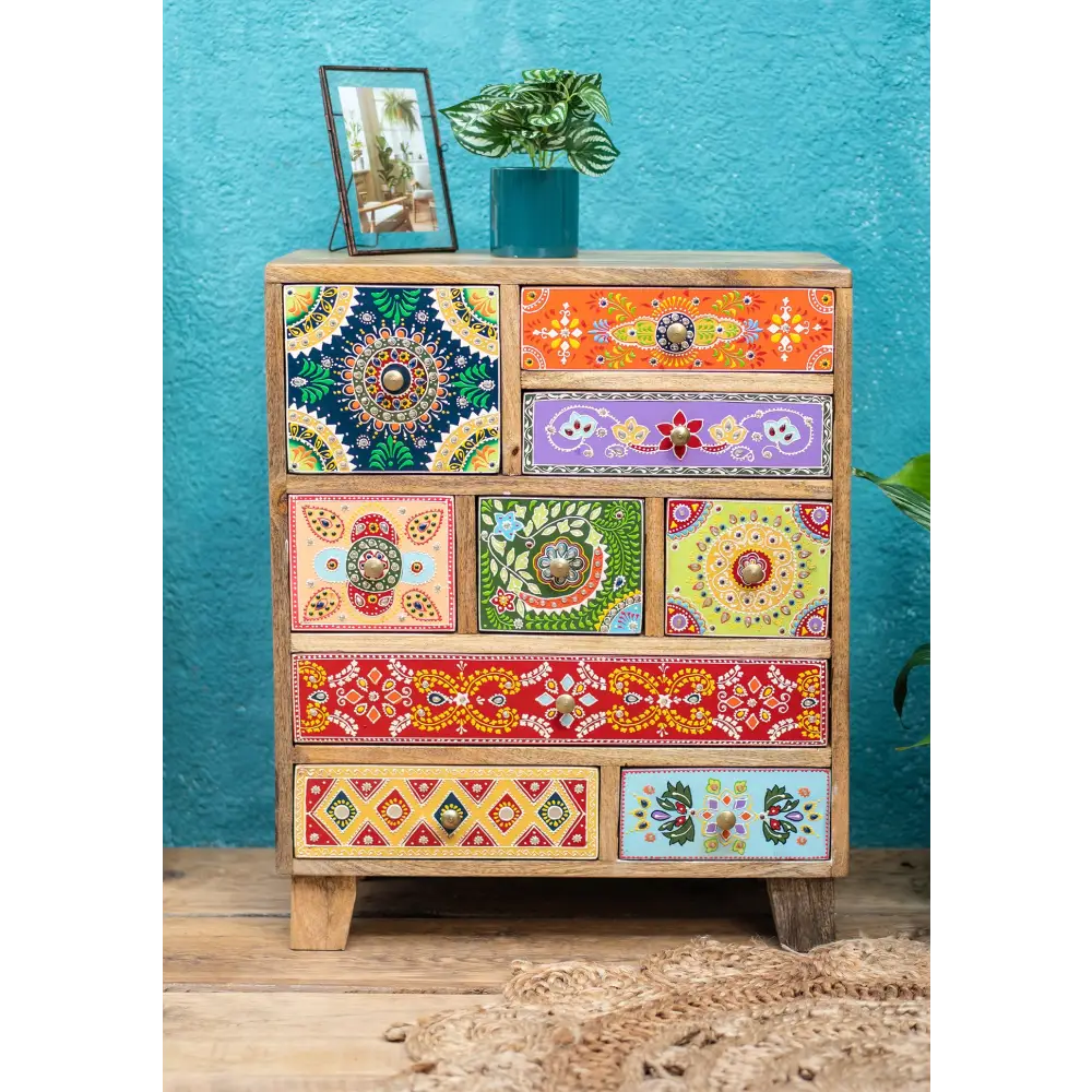 Hand-Painted 9-Drawer Sankalaka Cabinet. Colourful wooden dresser with patterned drawers
