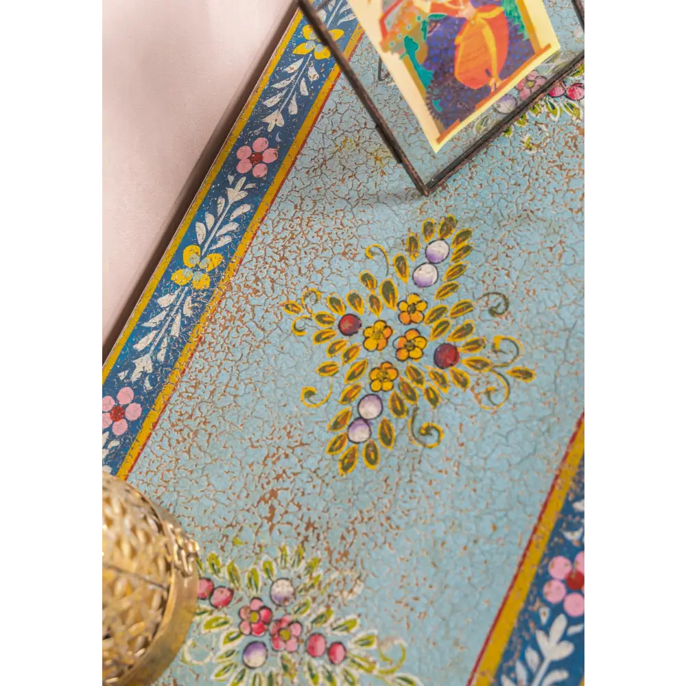 Hand-Painted Vintage Bedside Cabinet . Decorative floral pattern on a textured surface with a colourful border.