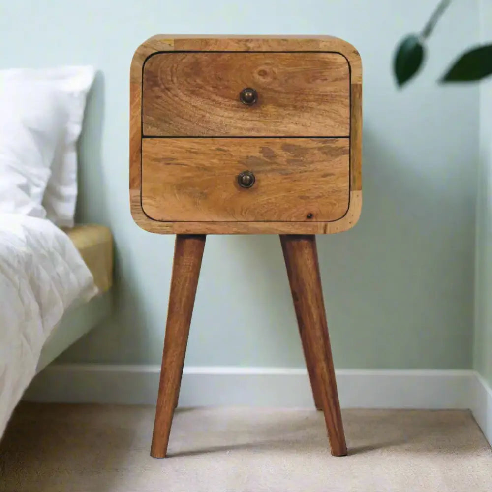 Eco-friendly home decor. Narrow Wooden bedside table with two drawers. Sustainable furniture.