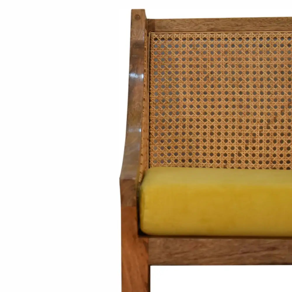Rattan chair with backrest and yellow cushion, available in other sumptuous colours