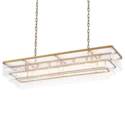 Luxury rectangular 3-tier chandelier with antique brass finish. Rectangular chandelier with gold frame and clear glass