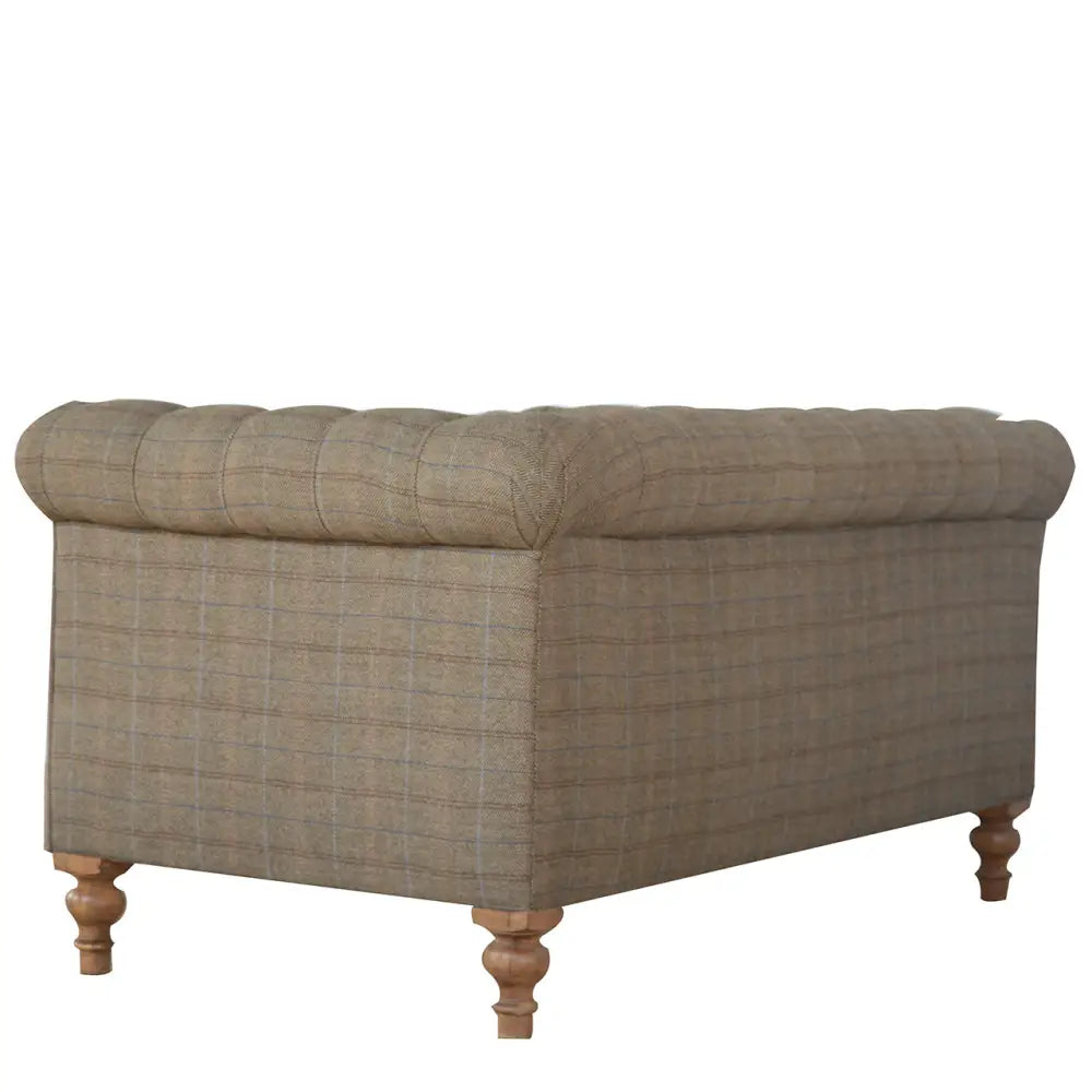 Tweed Chesterfield Sofa. Plaid-patterned sofa with wooden legs 