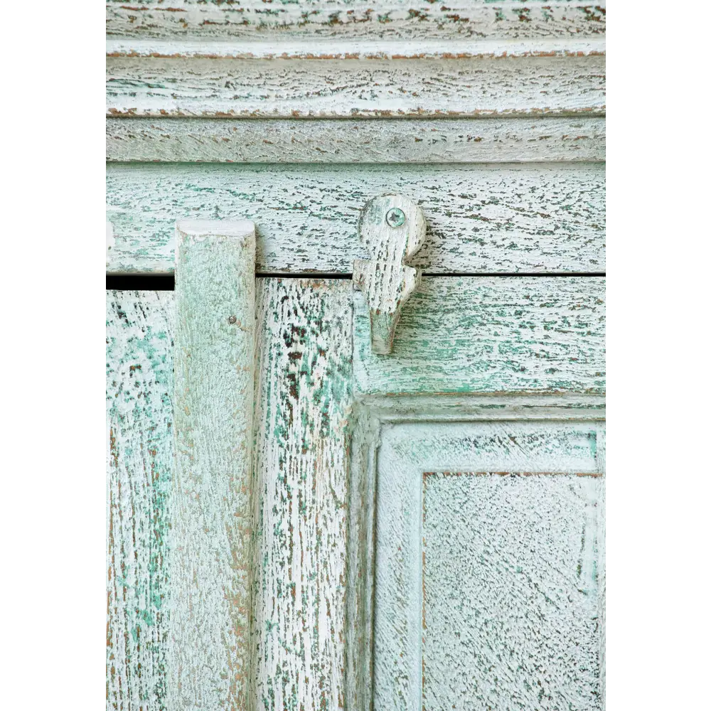 Tall Hand Painted Cupboard. Close-up of a weathered wooden door 
