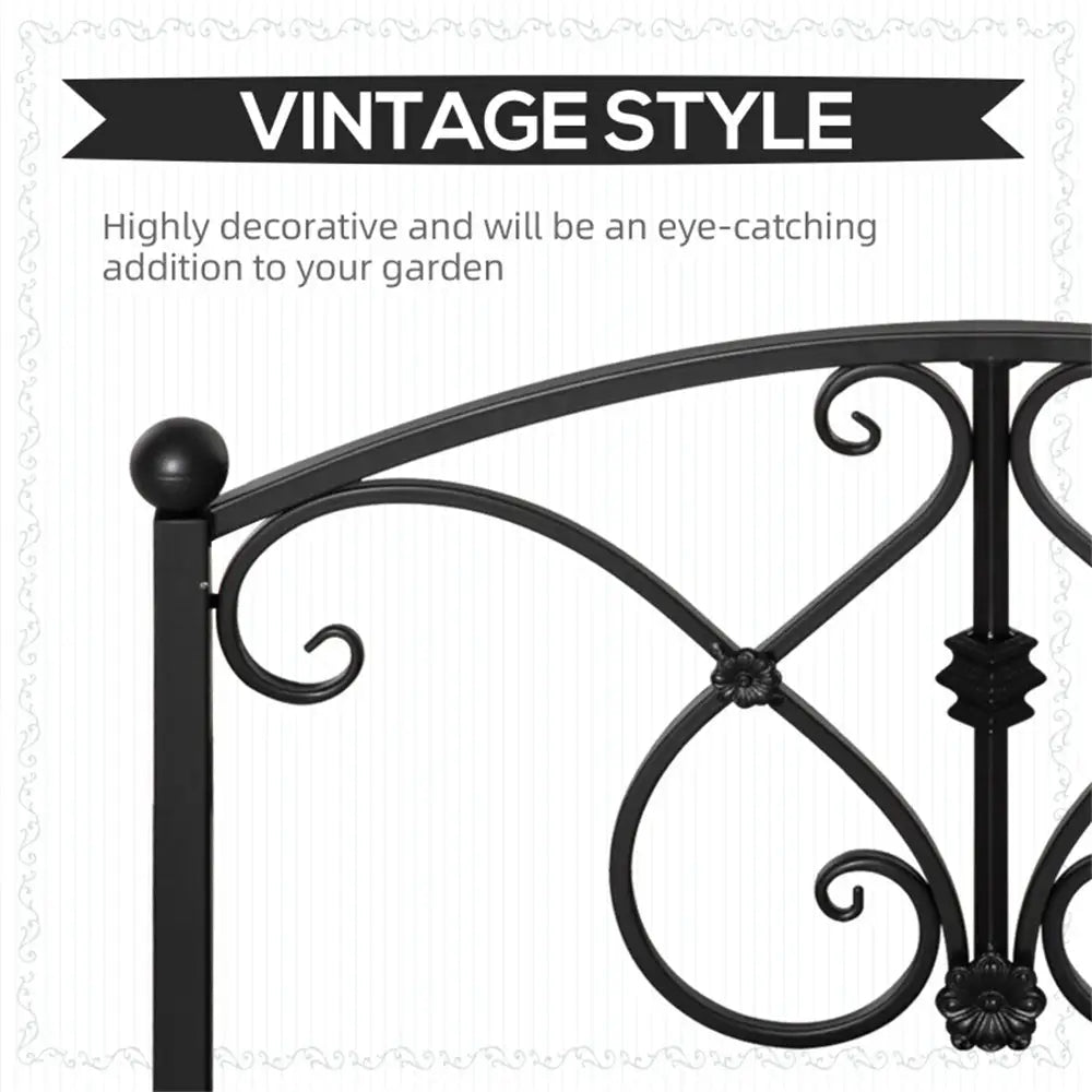 Vintage style steel frame garden bridge. Decorative black metal railing with vintage style text 