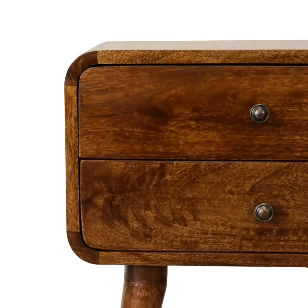Sustainable furniture. Wooden bedside table with two drawers and metal handles. Eco-friendly home decor.